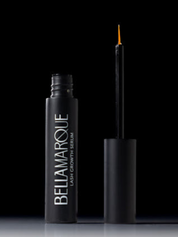 Open BellaMarque Lash Growth Serum with orange applicator on a dark background.