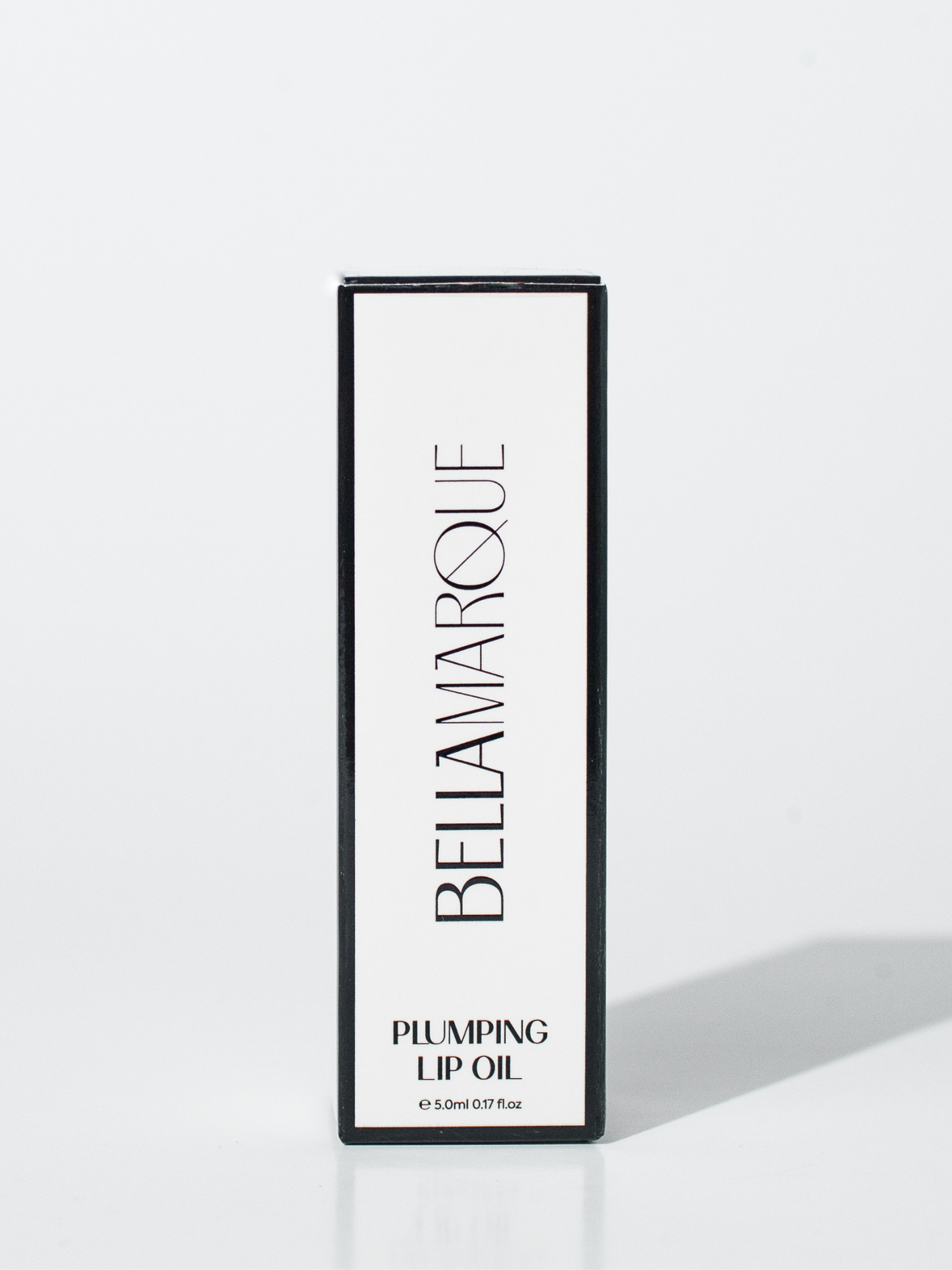 Black packaging box for Bellamarque Plumping Lip Oil