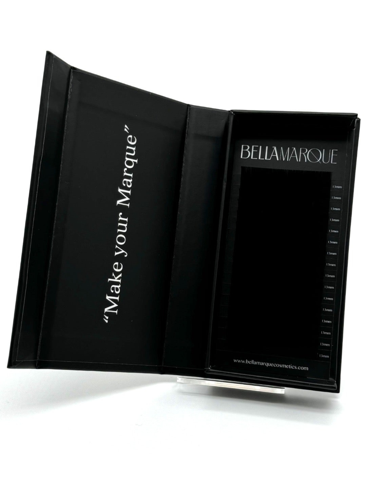 A black lash extension packaging open, showing multiple rows of fine black lashes with lengths labeled, next to the 'BELLAMARQUE' branding and website link.