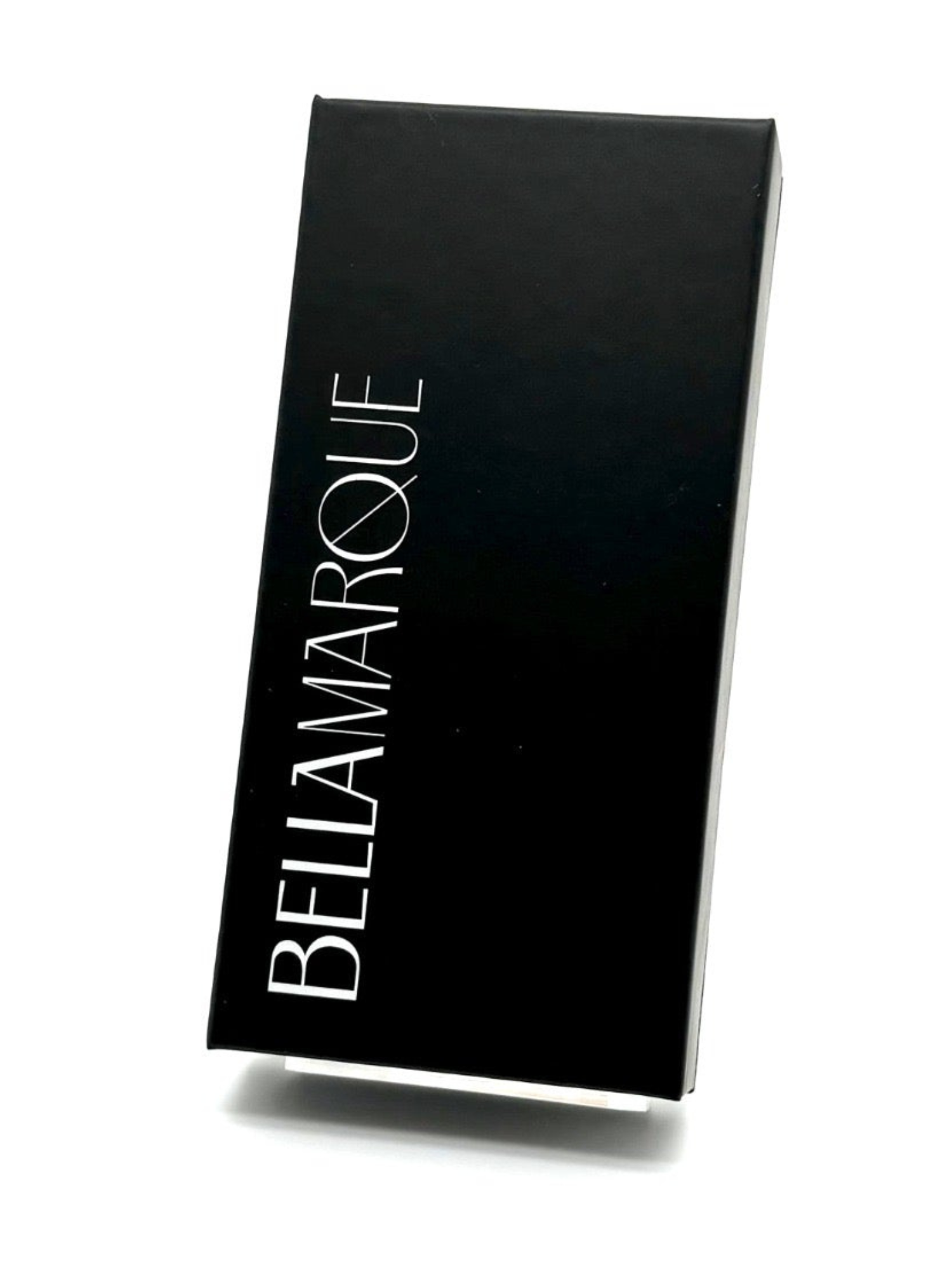 Elegant black packaging box for lash extensions, featuring 'BELLAMARQUE' in white lettering on a sleek, dark surface.