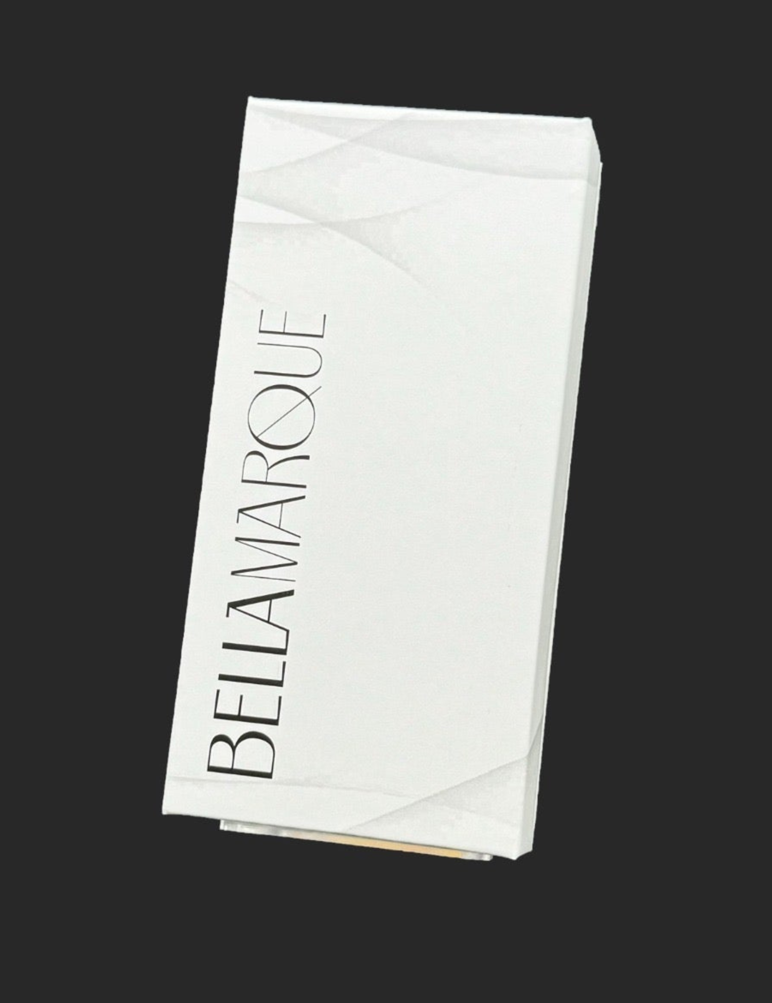 Closed white packaging box with 'BELLAMARQUE' in bold, elegant font on the top, set against a dark background.