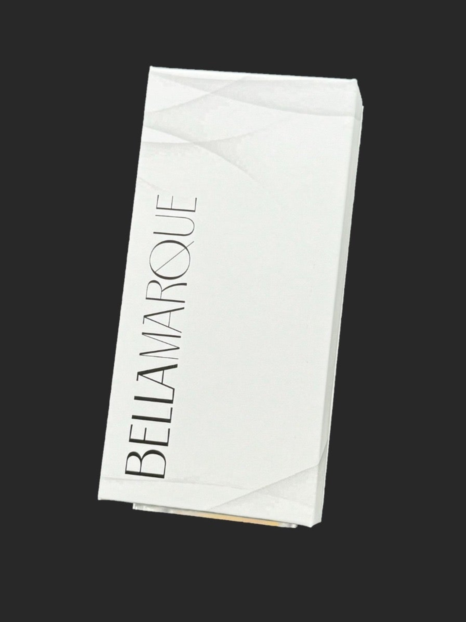 Closed white packaging box with 'BELLAMARQUE' in bold, elegant font on the top, set against a dark background.